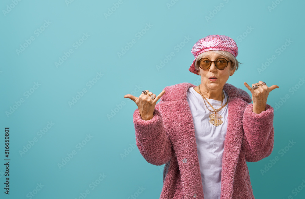 senior woman on color background.