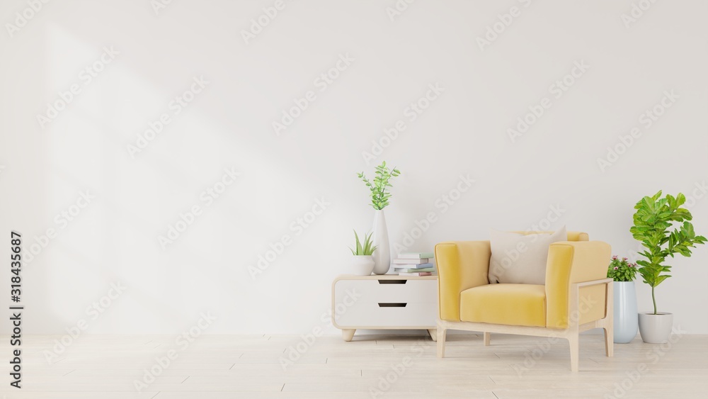 客厅，白色空墙背景上有黄色织物扶手椅、书籍和植物。