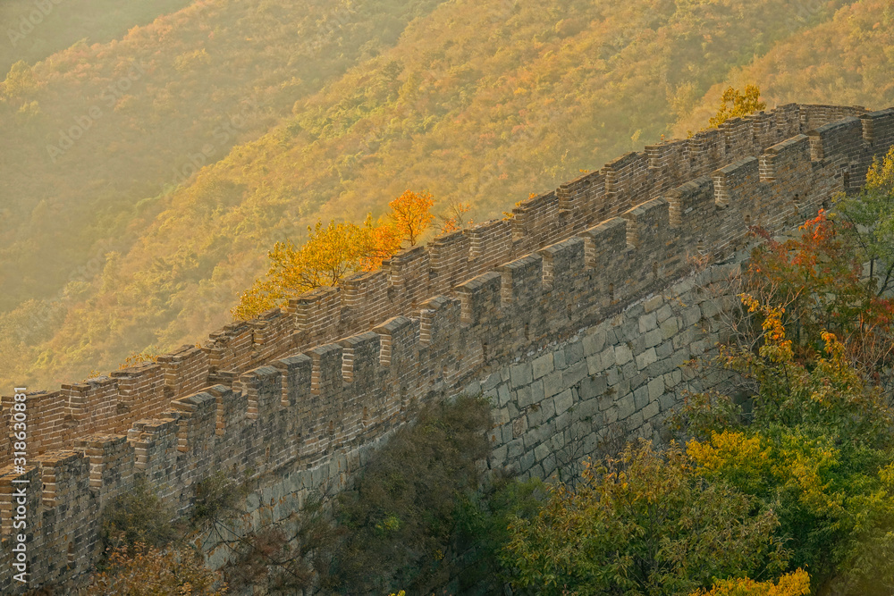 DRONE: Picturesque view of the Great Wall of China on a tranquil autumn evening.