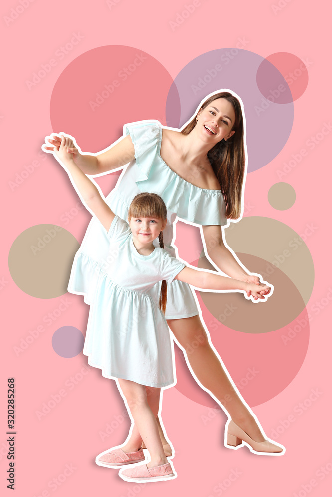 快乐的母亲和她的小女儿在彩色背景下跳舞