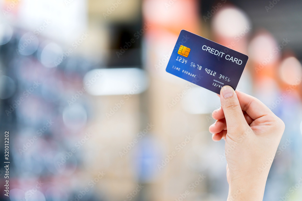 business shopping merchant ideas concept Close up of woman hand holding credit card for shopping wit