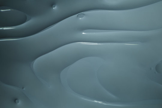 美丽的抽象背景灰色纹理曲线。水中的油滴。