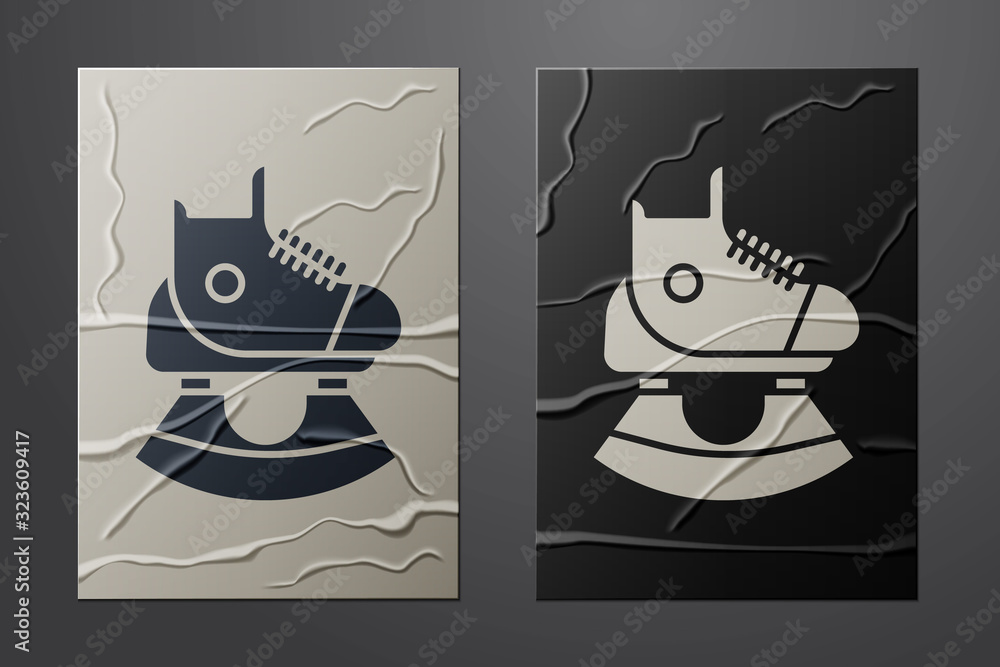 White Skates icon isolated on crumpled paper background. Ice skate shoes icon. Sport boots with blad