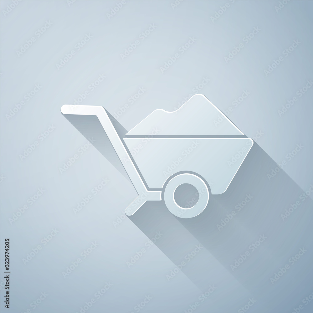 Paper cut Wheelbarrow with dirt icon isolated on grey background. Tool equipment. Agriculture cart w