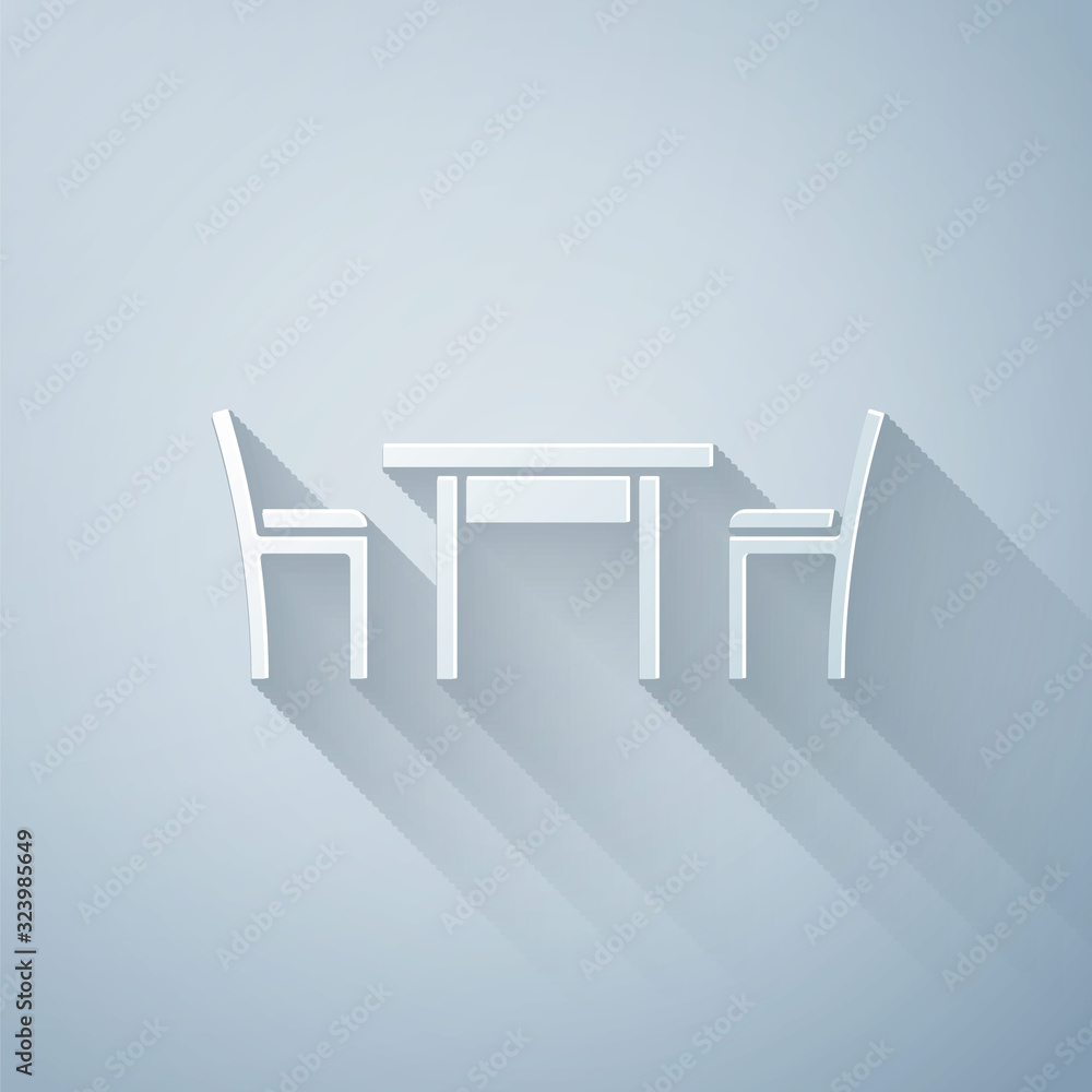 灰色背景上有椅子图标的剪纸木桌。纸艺风格。Vector Illustra