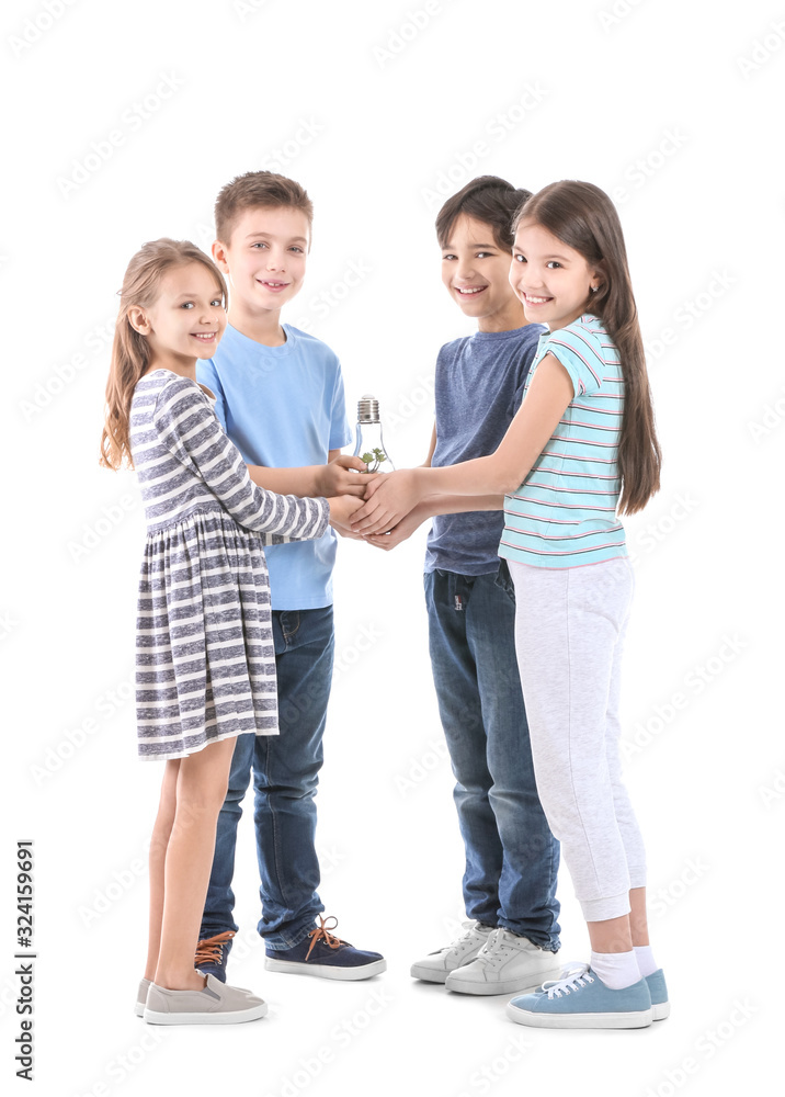 Little children holding light bulb with plant on white background. Earth Day celebration