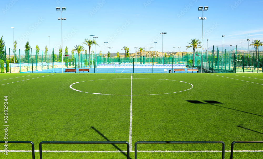 artificial grass soccer field in an outdoor sports complex