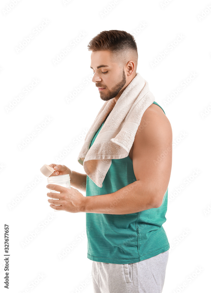 Sporty man with protein on white background