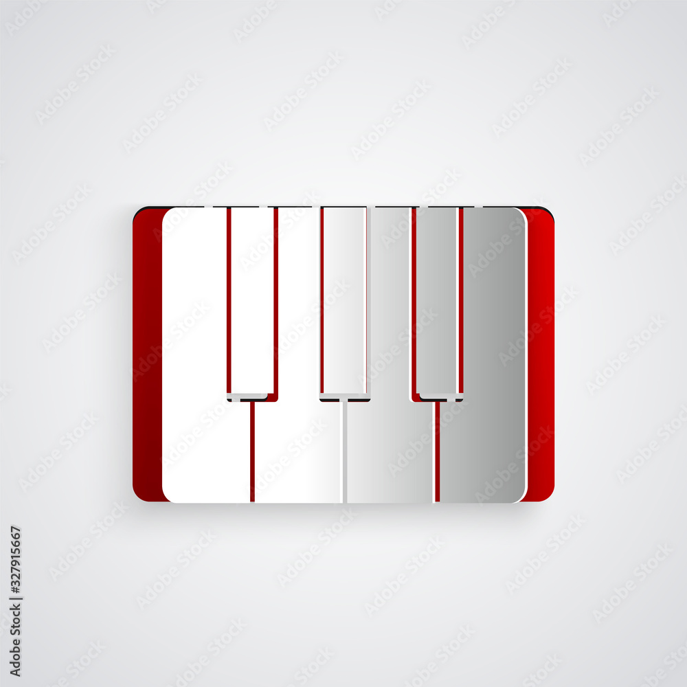 灰色背景上隔离的剪纸音乐合成器图标。电子钢琴。纸艺风格。Vec