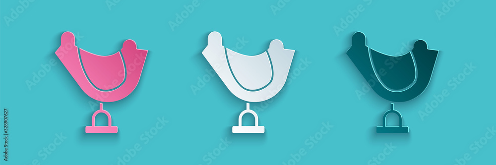 Paper cut Wild west saddle icon isolated on blue background. Paper art style. Vector Illustration