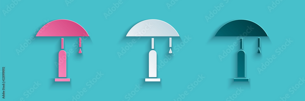 Paper cut Table lamp icon isolated on blue background. Paper art style. Vector Illustration