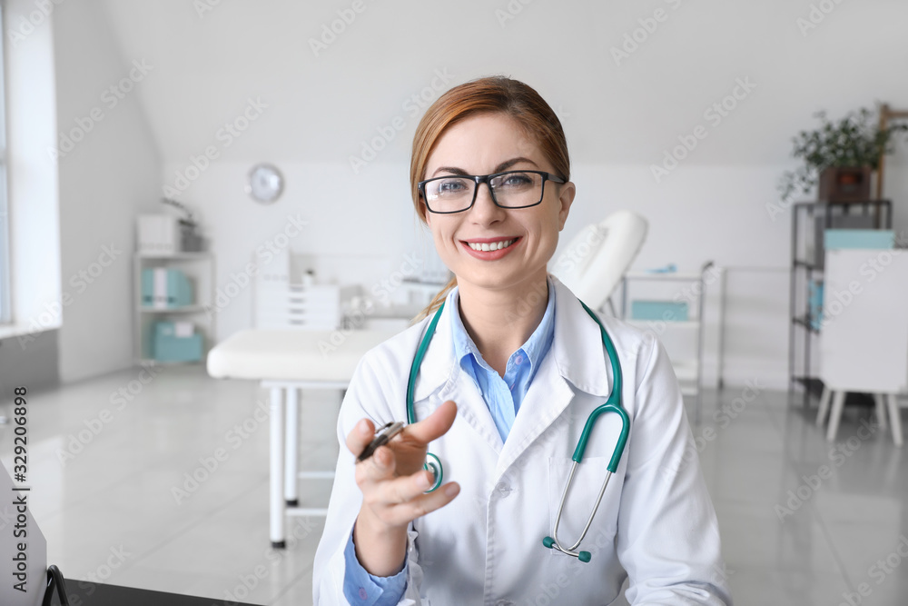 Female doctor using video chat in clinic