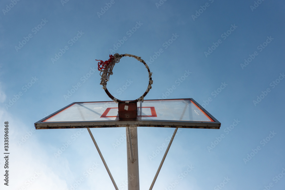 old basketball hoop in the sky