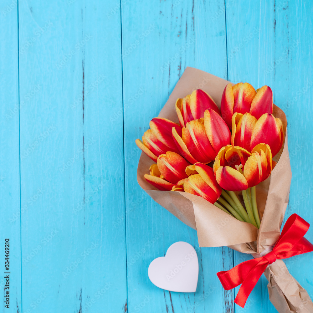 Tulip flower bunch, Mothers Day Design Concept - Beautiful Red, yellow bouquet isolated on blue woo