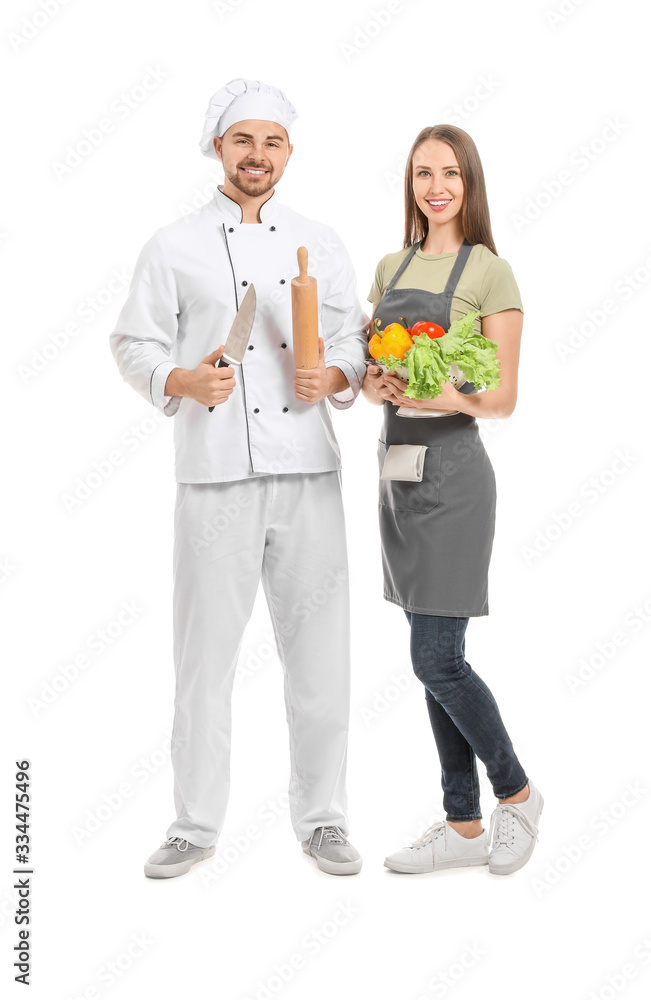 Male chef with participant of cooking classes on white background