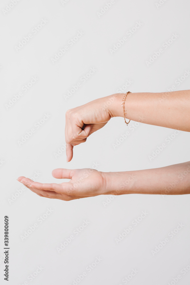 Woman pointing towards her palm