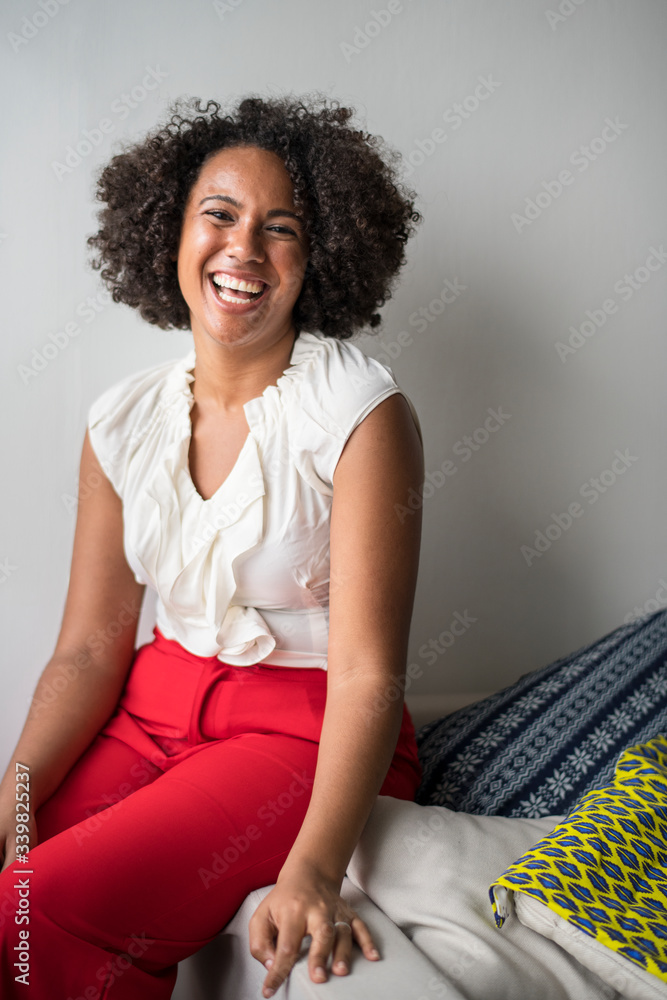 Woman laughing out loud with happiness