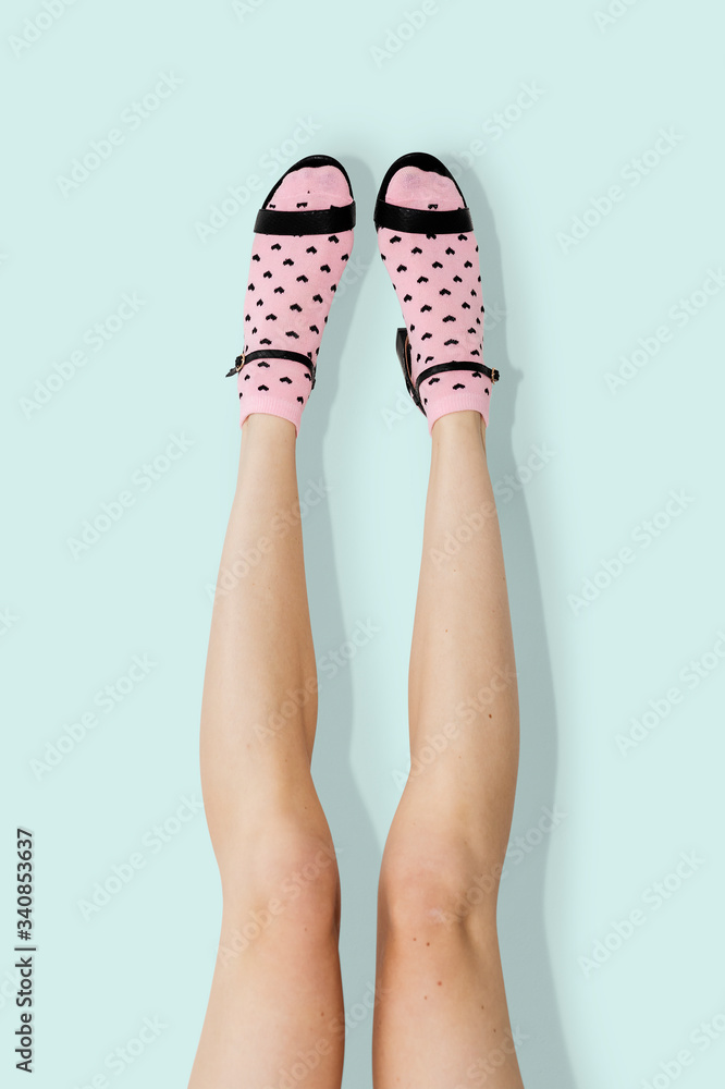 Woman wearing pink hear socks psd
