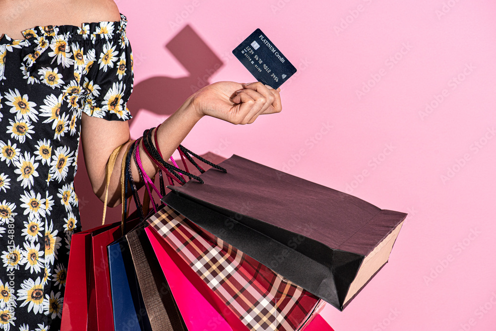 Shopaholic woman with shopping bags