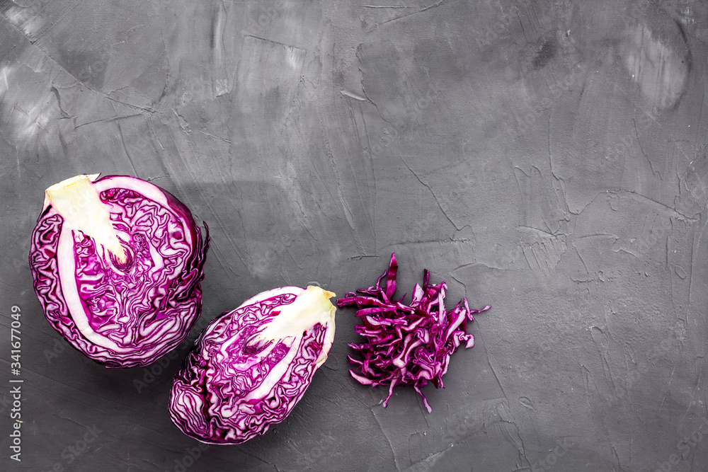 Red cabbage on grey table top down copy space