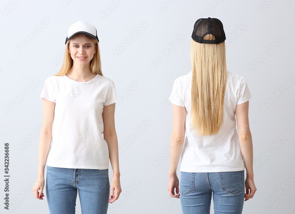美丽的年轻女子，戴着浅色背景的时尚帽子。正面和背面视图