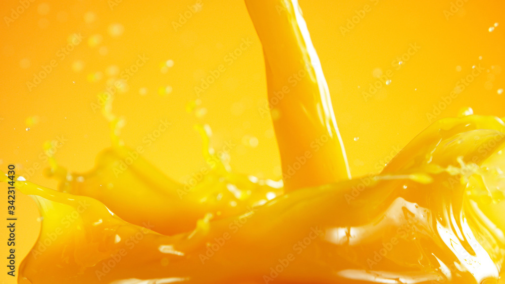 橙汁飞溅在彩色背景上