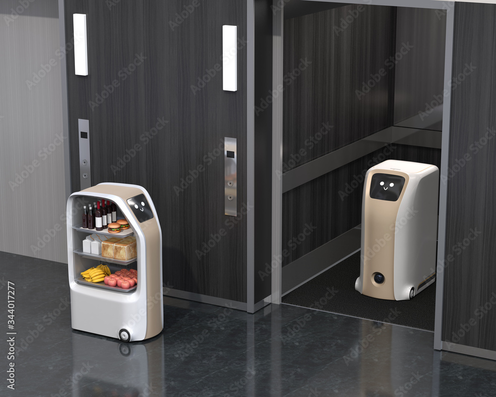 电梯里的送餐机器人，另一个在大厅里运送食物。无接触送餐概念。3