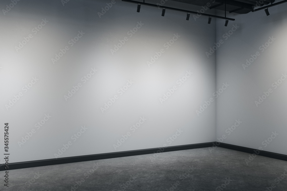 极简主义室内，灰色墙上有复制空间