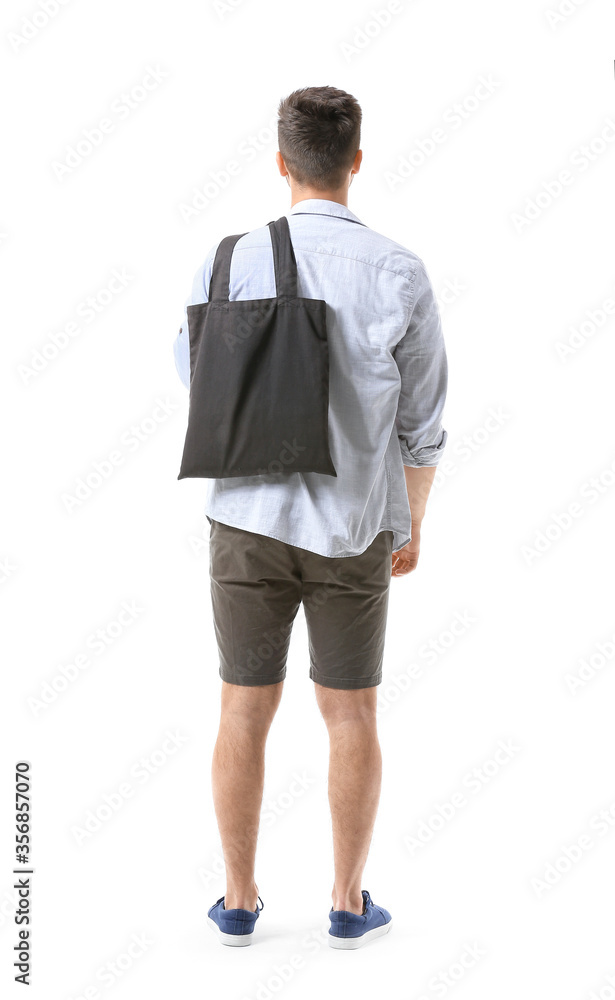 Young man with eco bag on white background, back view