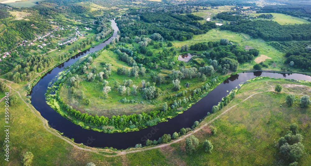 River curve from aerial view. Countryside landscape with summer scenic panorama.