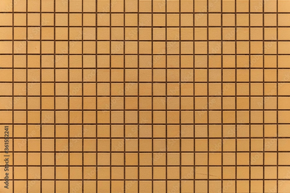 黄色或棕色陶瓷墙和地砖抽象背景。设计几何马赛克纹理fo