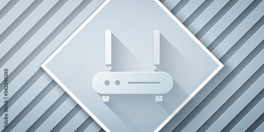 剪纸路由器和wi-fi信号图标在灰色背景上隔离。无线以太网调制解调器路由器。