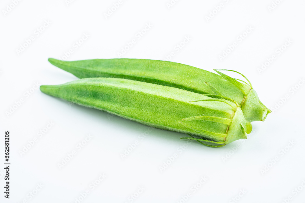 Fresh vegetable okra on white background