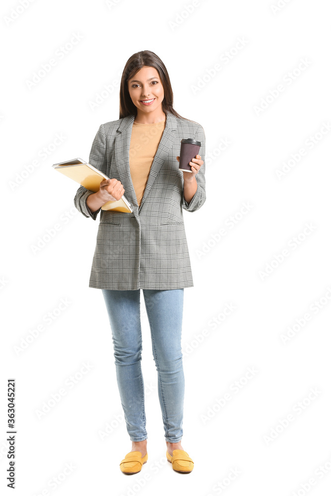 Portrait of young businesswoman with coffee on white background
