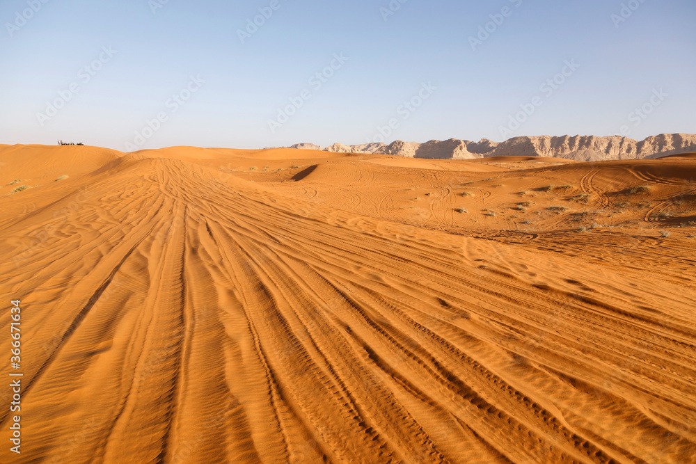 Red sand dunes called Red Sands south of Riyadh. You can see the lanes of quads because the dunes ar