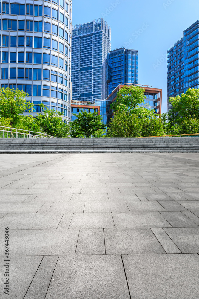 Empty square floor and modern commercial buildings in Shanghai,China.