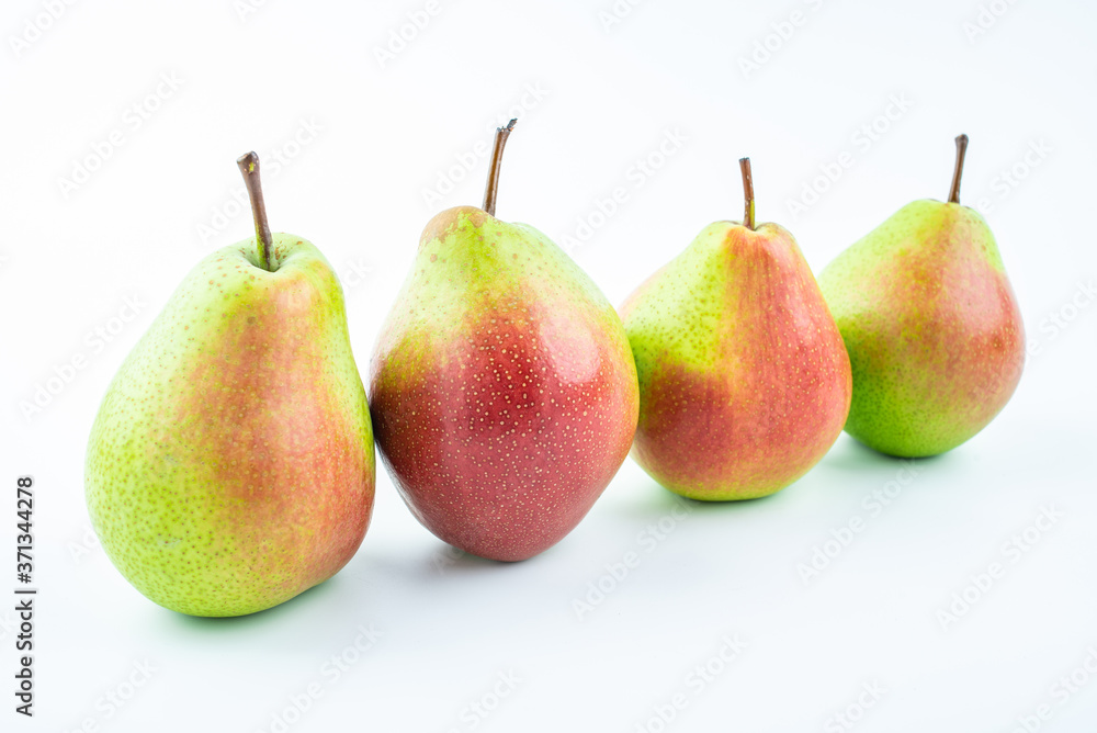Fresh red crispy pears on white background
