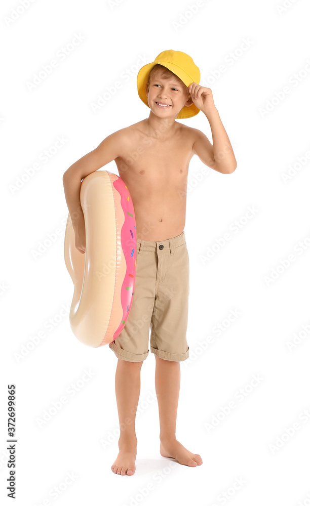 Cute little boy with inflatable ring on white background
