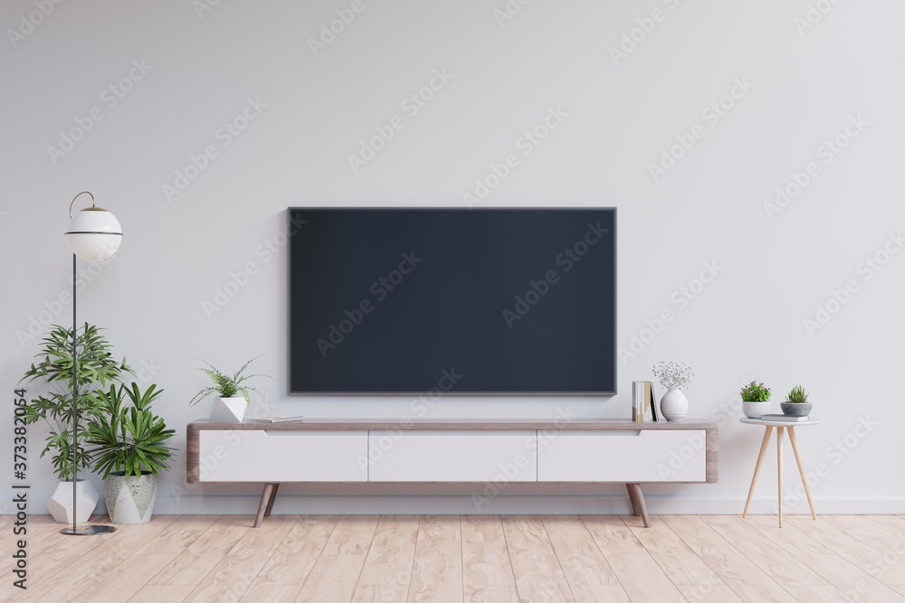 白色背景的现代客厅橱柜上的电视。