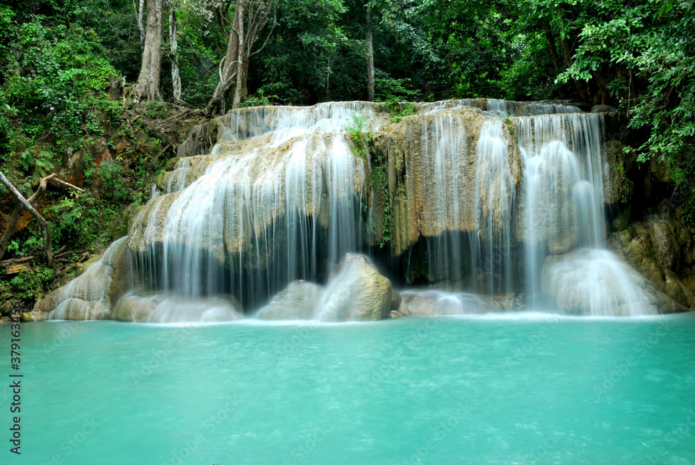 Erawan Waterfall, Karnchanaburi, Thailand, with water curtian and stream blue water pool