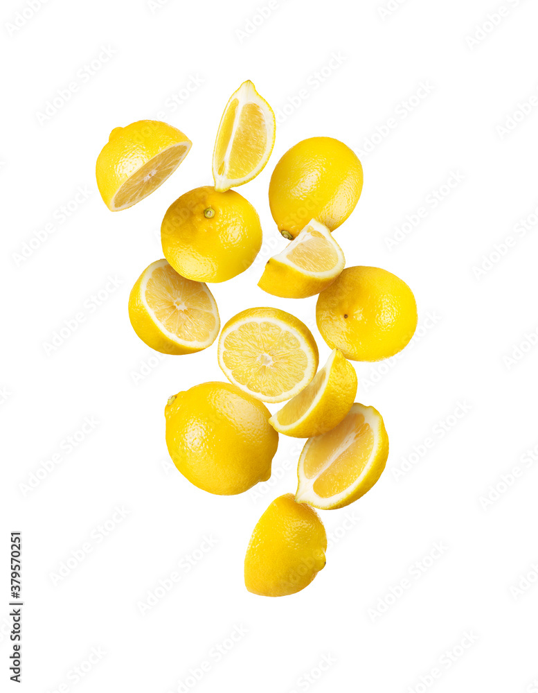 Whole and sliced fresh lemon in the air isolated on white