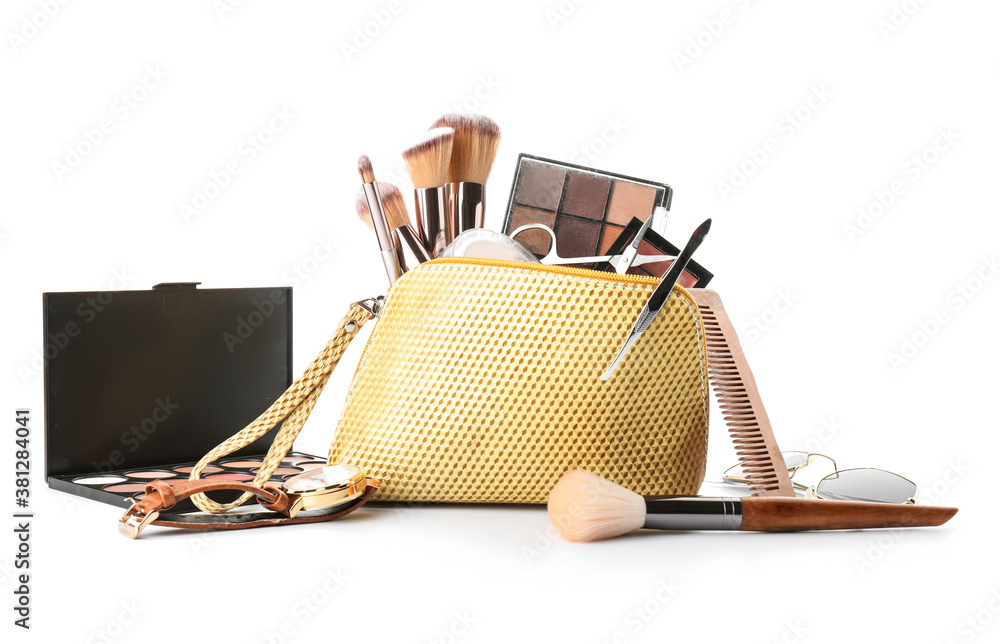 Makeup bag with decorative cosmetics and accessories on white background