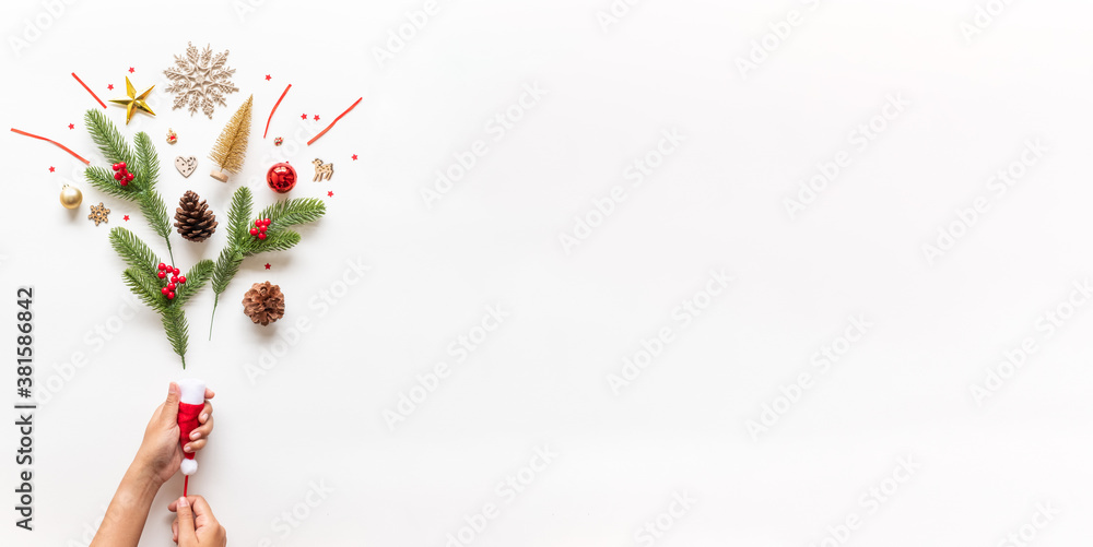 Party popper with chrsitmas decoration isolated over white background for happy new year celebration