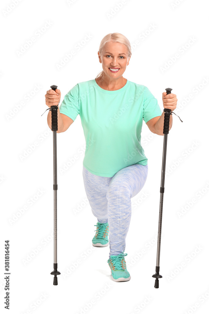 Mature woman with walking poles on white background