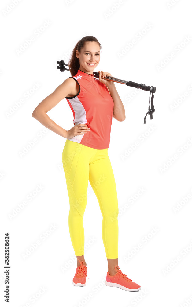 Young woman with walking poles on white background