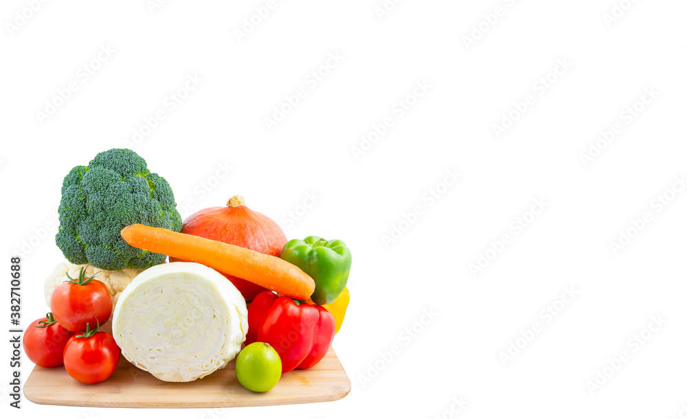 Group vegetables and Fruits Apples, bananas in a wooden basket with carrots, tomatoes, guava, chili,