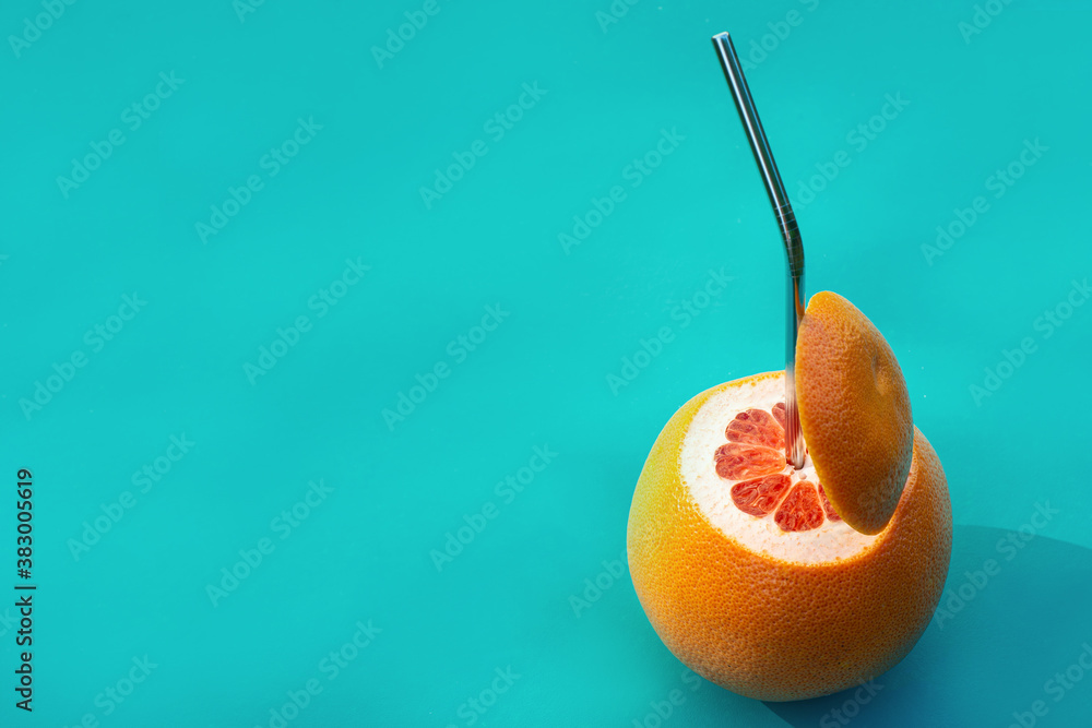 Red Grapefruit with metal straw