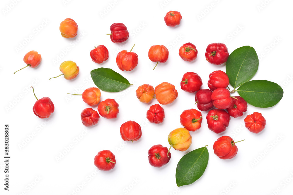 Flat lay of colorful Acerola cherry with green leaves on white background, Top view