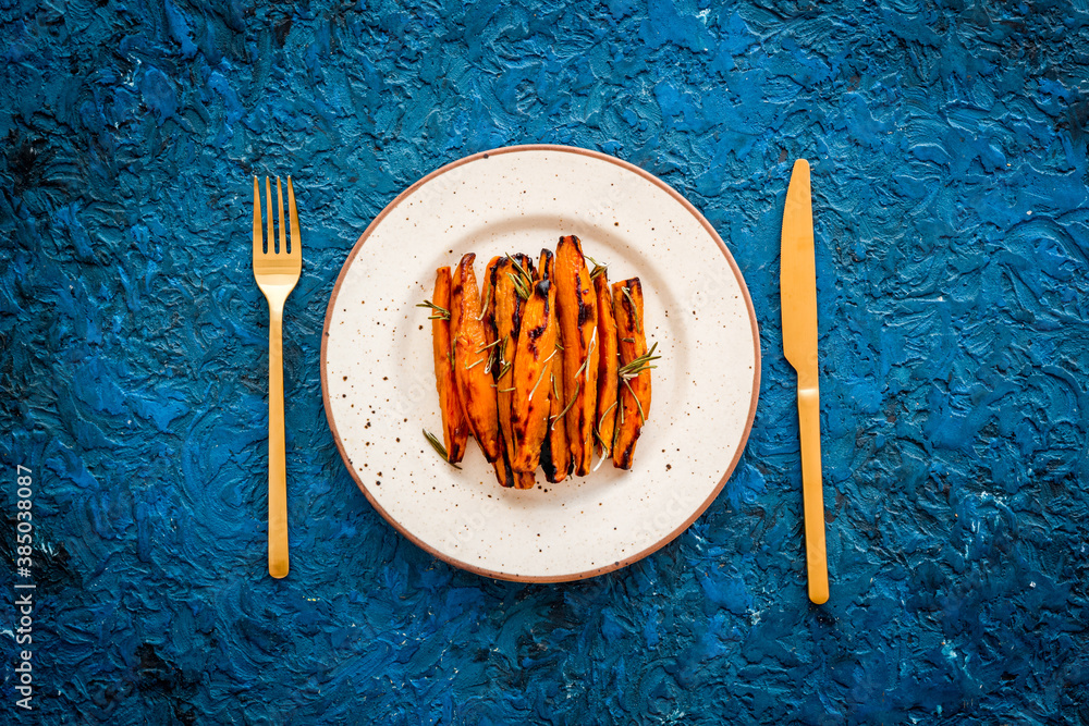 Homemade baked sweet potato - fries with spices, top view