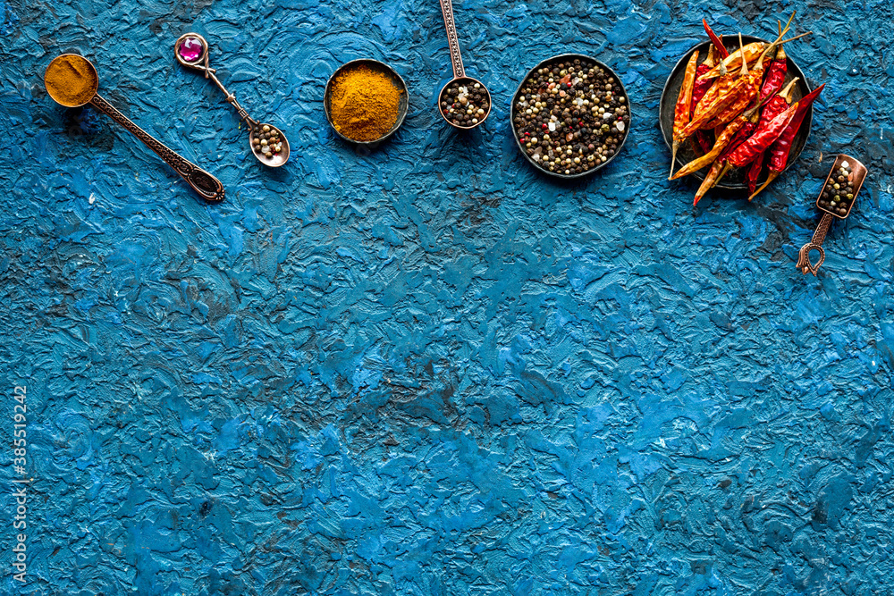 Flat lay of Indian hot spices and herbs, top view